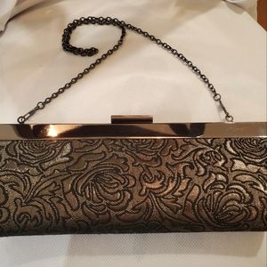 Jessica McClintock evening clutch w/ metal strap.Gold & black inlay rose pattern